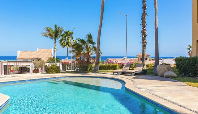 Stylish 2-Bedroom Condo with Ocean Views | Walk to Town | Pool & BBQ Area