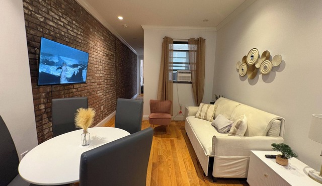 Stylish 2BR Midtown West Apartment w/Exposed Bric