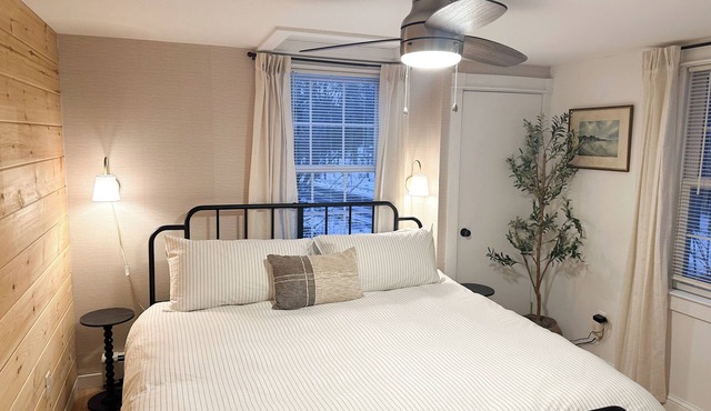 Stylish 2BR Retreat w/Sunroom + Fireplace Near Gunstock. Across from Lake Winnie