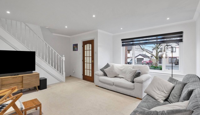 Stylish 3-Bed Home with Private Garden in Airdrie