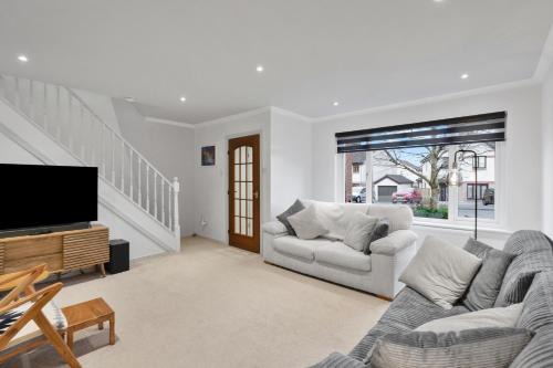 Stylish 3-Bed Home with Private Garden in Airdrie