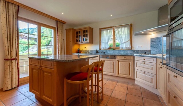 Stylish Alps apartment near Rougemont Village with mountain views.