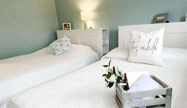 Stylish condo steps from the beach! Elegant blend of comfort and convenience.