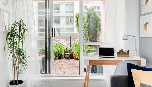 Stylish downtown apartment with private patio and parking