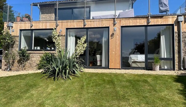 Stylish, light and airy property with wonderful views and garden.