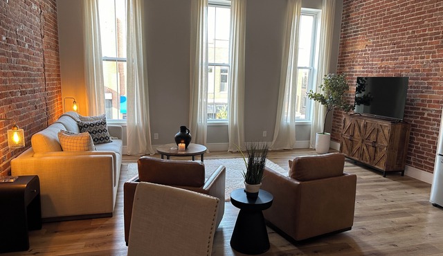 Stylish & Modern 2-Bdrm Apt in Downtown Warsaw featuring an urban rooftop deck.