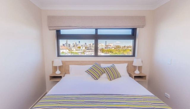 Stylish, modern king hotel room in Brisbane