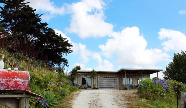 Stylish modern bach with rural and water views