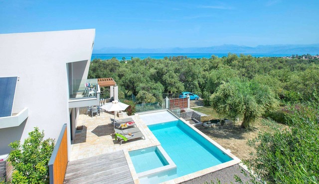 Stylish Modern Villa, A/C, Private Pool & Fabulous Sea Views 15mins walk to Acharavi or Roda Beach!