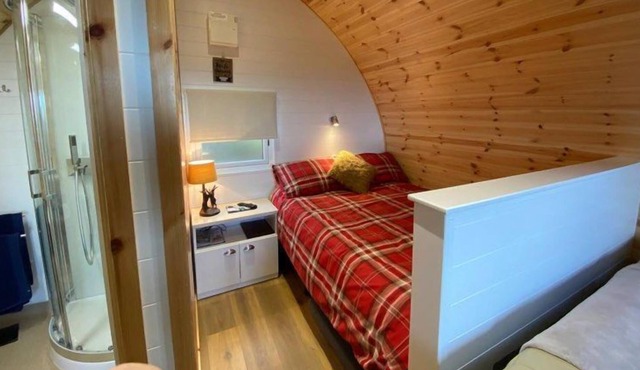 Stylish pod is situated in a large meadow
