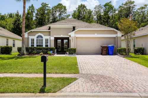 Stylish retreat with a private, heated pool, central AC, & garage game room