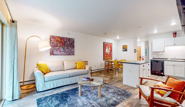 Stylish ski-in/out condo with fireplace and resort pool access