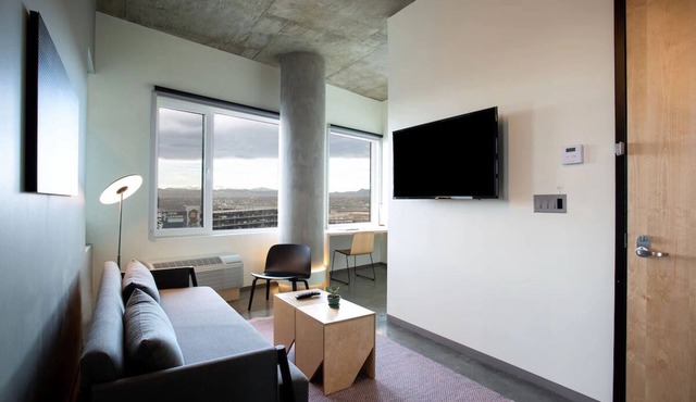 Stylish Skyline Suite with Stunning City Views, Spacious Interiors, and Luxury