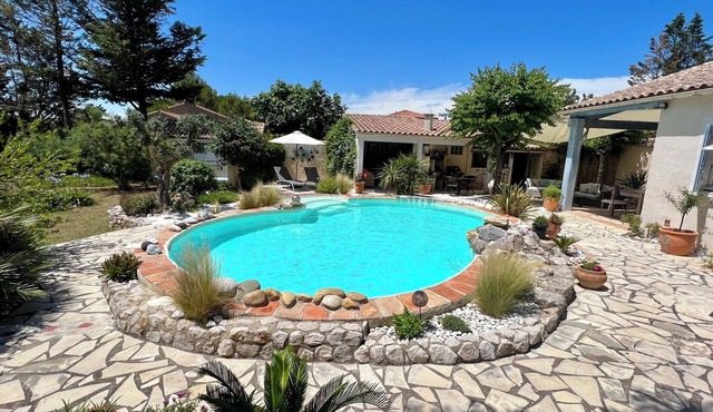 Stylish villa with landscaped pool set in large secluded garden close to Pezenas