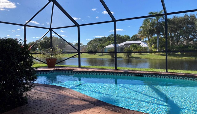 Stylish Waterfront Home w/Heated Pool, 8 miles to the Beach, Close to Shopping.