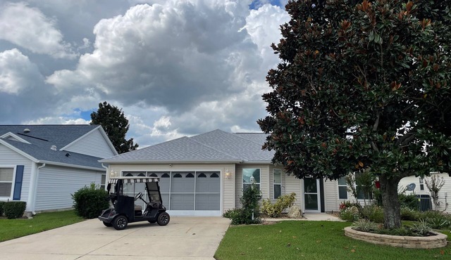 Stylish Winifred Home w/Lanai, Patio, & Golf Cart Near Lake Sumter Landing