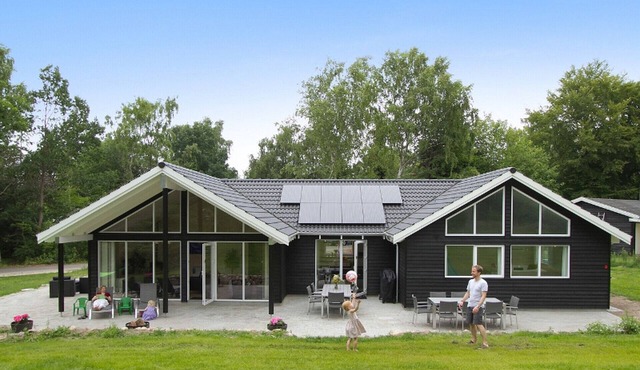 Stylishly furnished poolhouse with activity room for 14 people