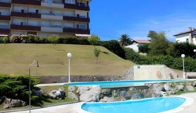 Suances con garaje privado, piscina , pie de playa