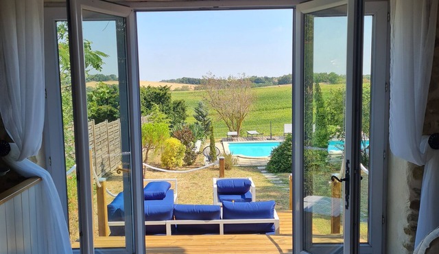 Substantial house with heated pool & stunning views in a picturesque village.