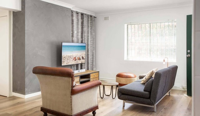 Suburban Two-bed Apartment with Parking and Patio