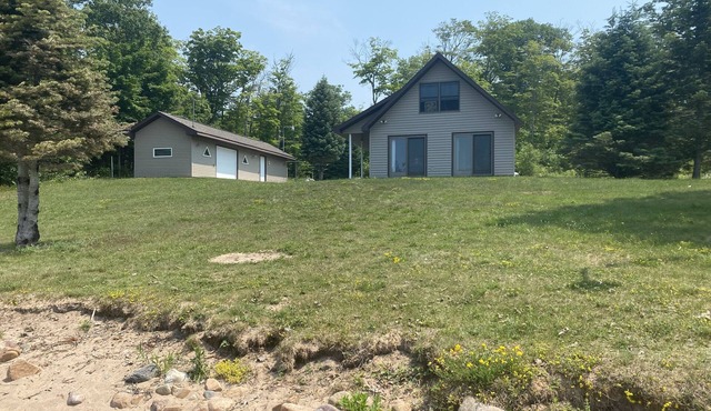 Sugar Island, Michigan: Waterfront cabin with beautiful sunsets and beach.