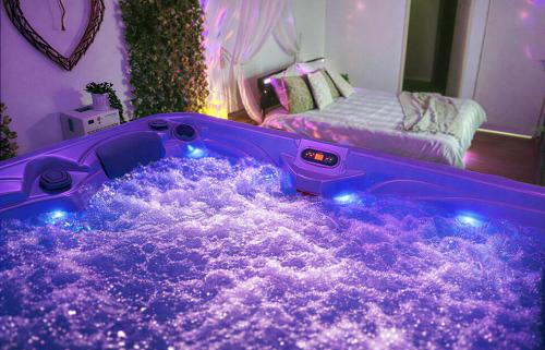 Suite romantique avec jacuzzi privatif, parenthèse intime et discrète