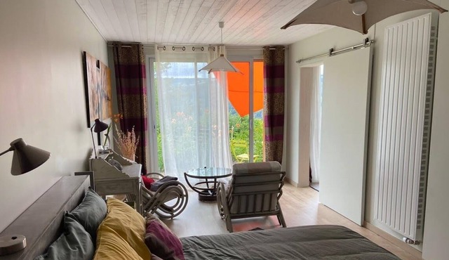 Suite with terrace, overlooking the Monts du Sancy, near La Bourboule.