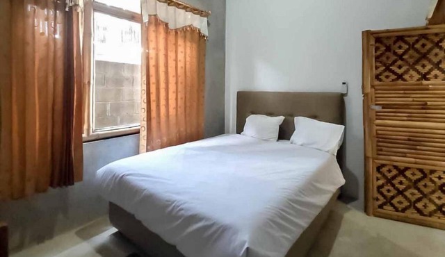 Sukawana Guest House Mitra RedDoorz