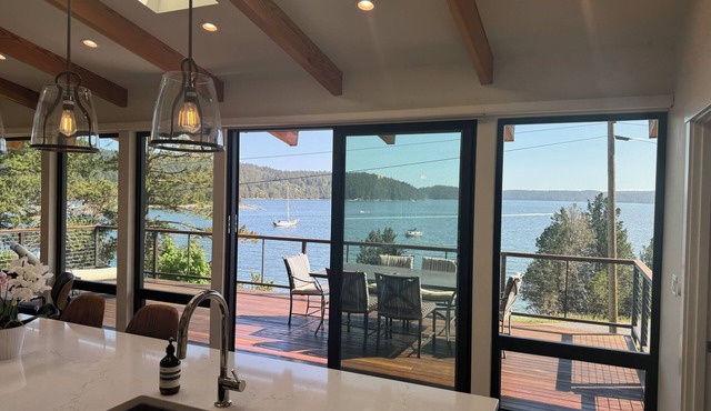 Summer Daze - enjoy in/outdoor living in this new ocean front designer home.