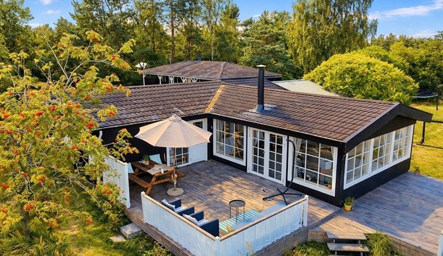 Summer house near beach and forest with large garden