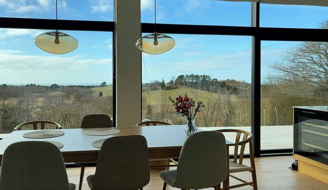 Summer house on hillside plot by Sejerø Bay