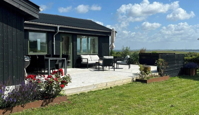 Summer house with wilderness bath and water views