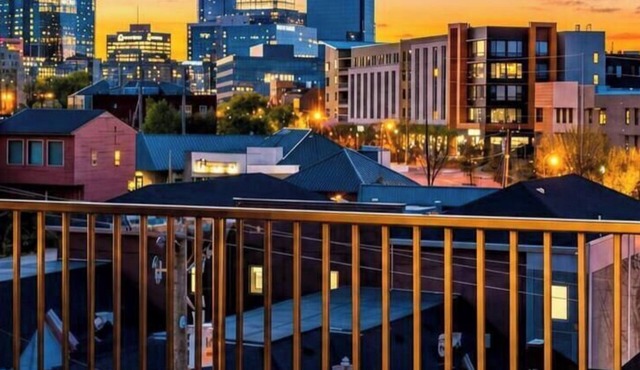 Summer rooftop deck, skyline views, garage door kitchen near Broadway