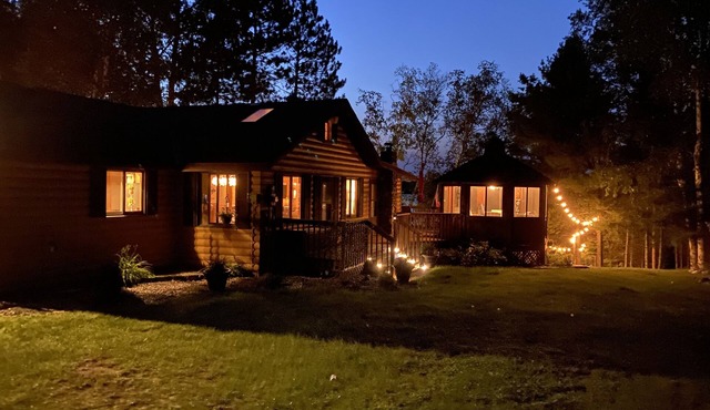 “Summerhouse” Surrounded by towering pines, big water views & sandy shores