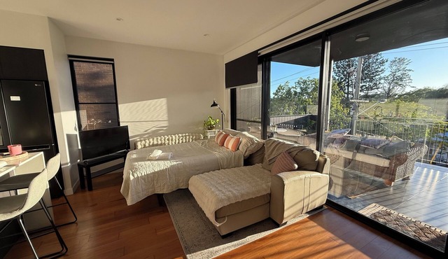 Sun-Drenched Indooroopilly Apartment with Modern Design & Expansive Balcony,