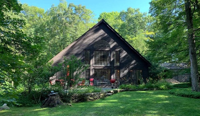 Sun filled cottage in the woods
