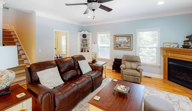 Sun-kissed home with AC, fireplace & W/D - short drive to the beach