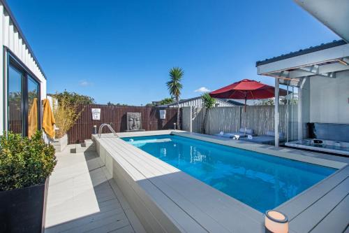 Sun Kissed Pool Villa - Mangawhai Holiday Home
