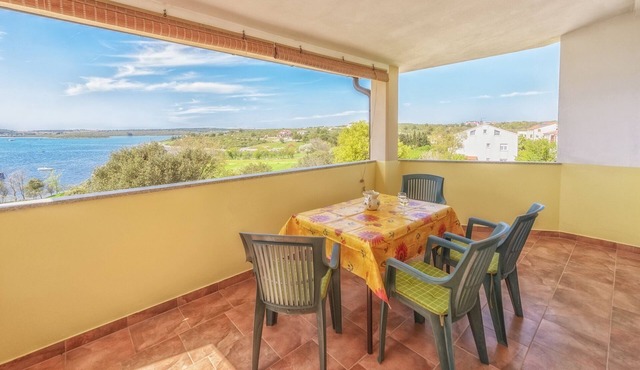 Sun&Sea Apartments A4(4+2) oversees Medulin bay for a relaxing vacation