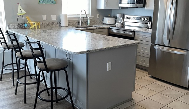 Sun Skipper Ocean Front Top Floor Pink Coral Buidling