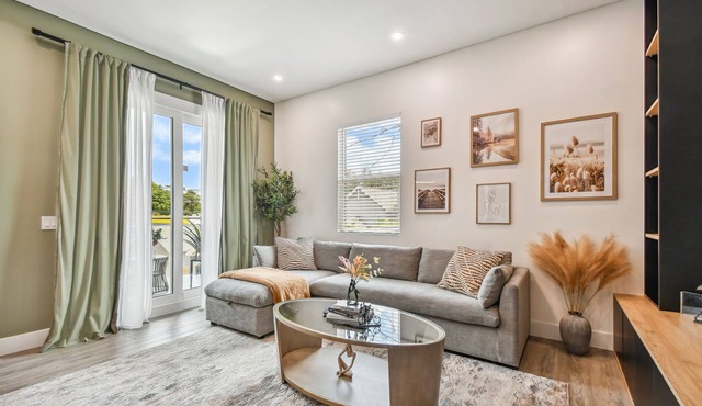 Sun Soaked Designer Condo with Patio