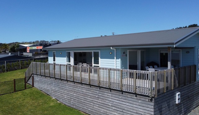 Sunkissed Sands- A Hop Skip and A Jump to Coopers Beach