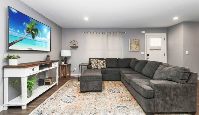 Sunlit Renovated Home | Sunroom, Porch & Trails Nearby