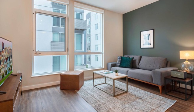 Sunlit SoMa 2BR w/ Gym, Roofdeck, walk to Tech HQs and BART, by Blueground