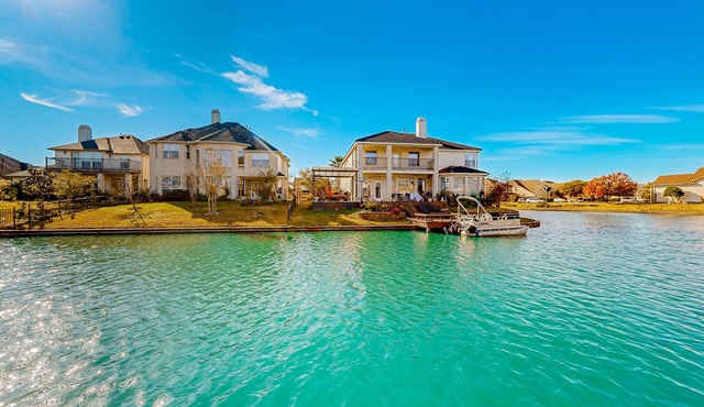 Sunlit waterfront retreat with patio, fireplace, & kayaks - near golf