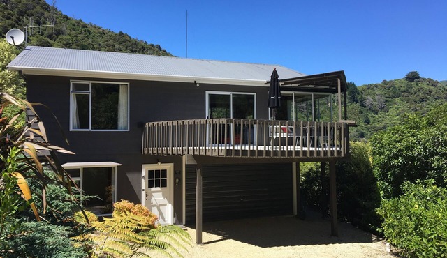 Sunny bach above secluded swimming beach