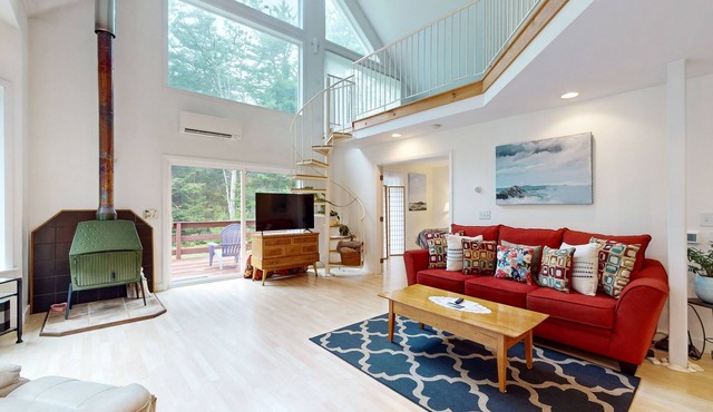 Sunny coastal retreat with deck, grill, beach, dock, & ocean access