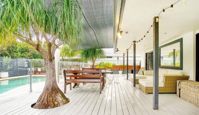 Sunny Days Poolside at an Entertainer's Oasis