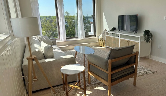 Sunny downtown Belfast apartment with water view, right on Main St near eateries