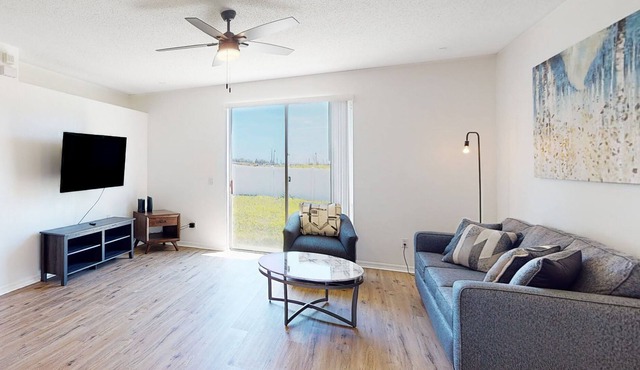 Sunny home near Disney with enclosed backyard, fast WiFi, W/D, patio, central AC